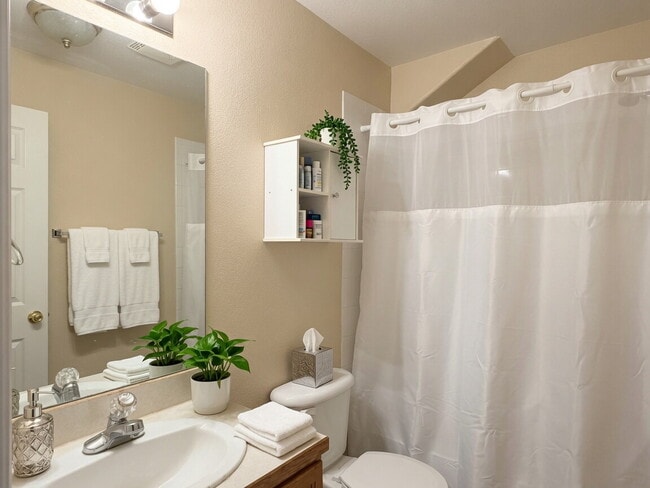 Building Photo - Lakeside 3 Bed/2.5 Bath Townhome in Gateway Community! Quiet, Scenic Living in The Heart Of Denver!