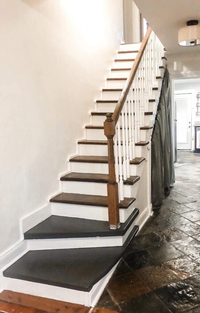 newly refinished staircase and handrail - 2113 Toledano St