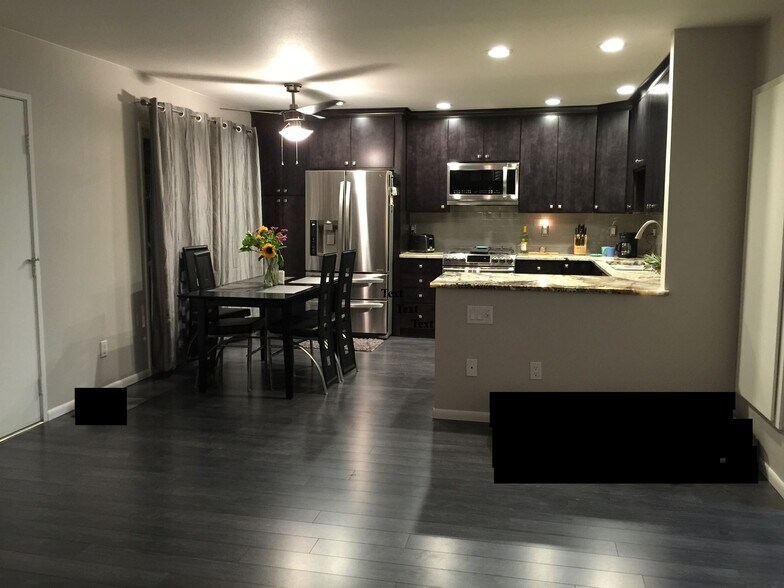 Open Concept Dining + Kitchen - 1950 S Palm Canyon Dr