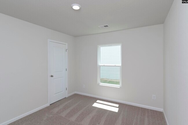 Building Photo - 807 Red Berry Ln