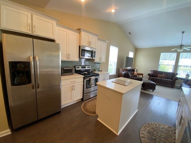 Building Photo - Welcome to this fully furnished 3-bedroom, 3-bathroom townhouse located in the vibrant Hawkeswate...