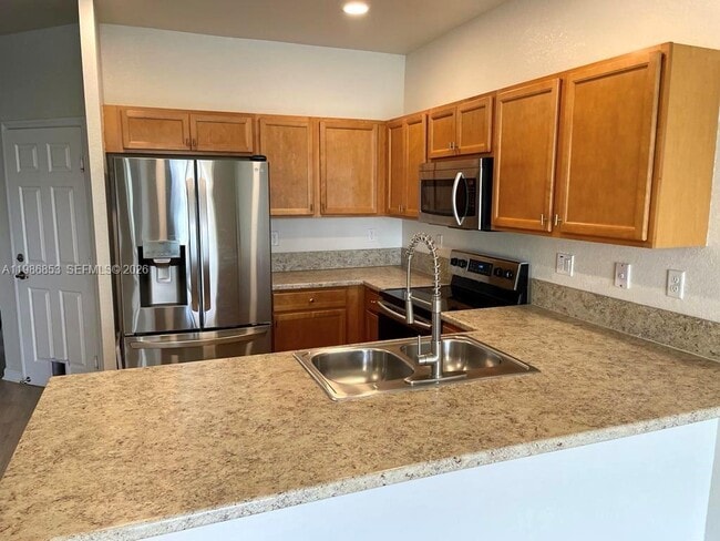 Building Photo - 9370 W 34th Ct