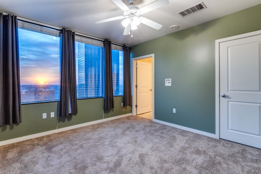 bedroom with sunset view - 1200 Main St