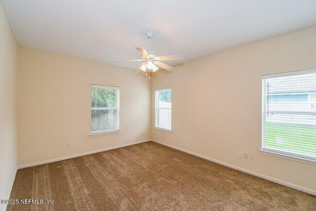 Building Photo - 7068 Rapid River Dr W