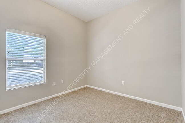 Building Photo - 6788 Manotak Oaks Dr
