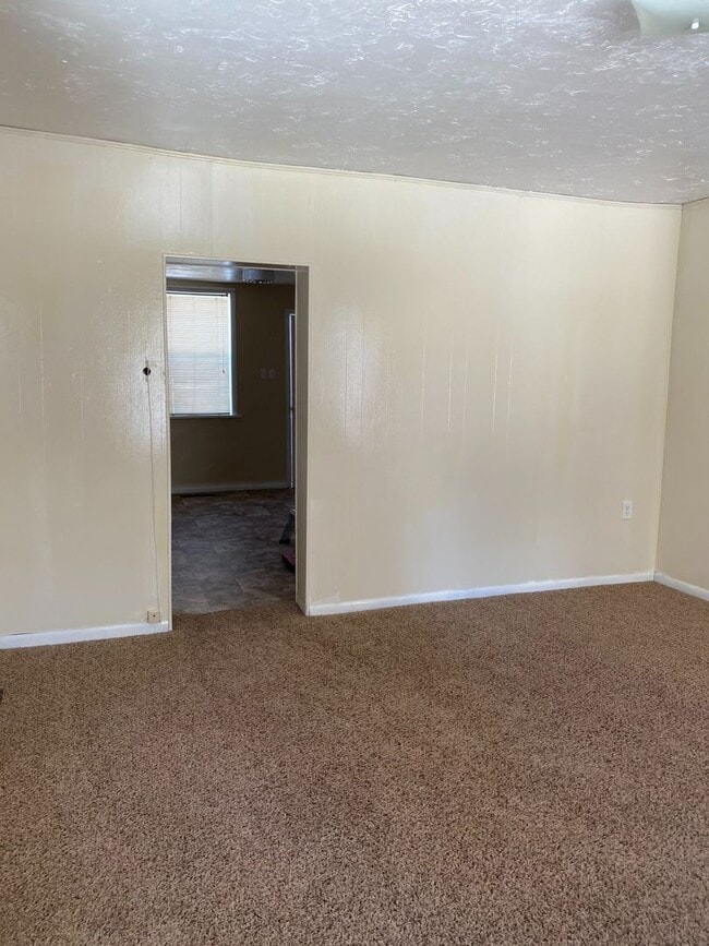 Building Photo - Cozy 2-Bedroom Home with Spacious Yard – C...