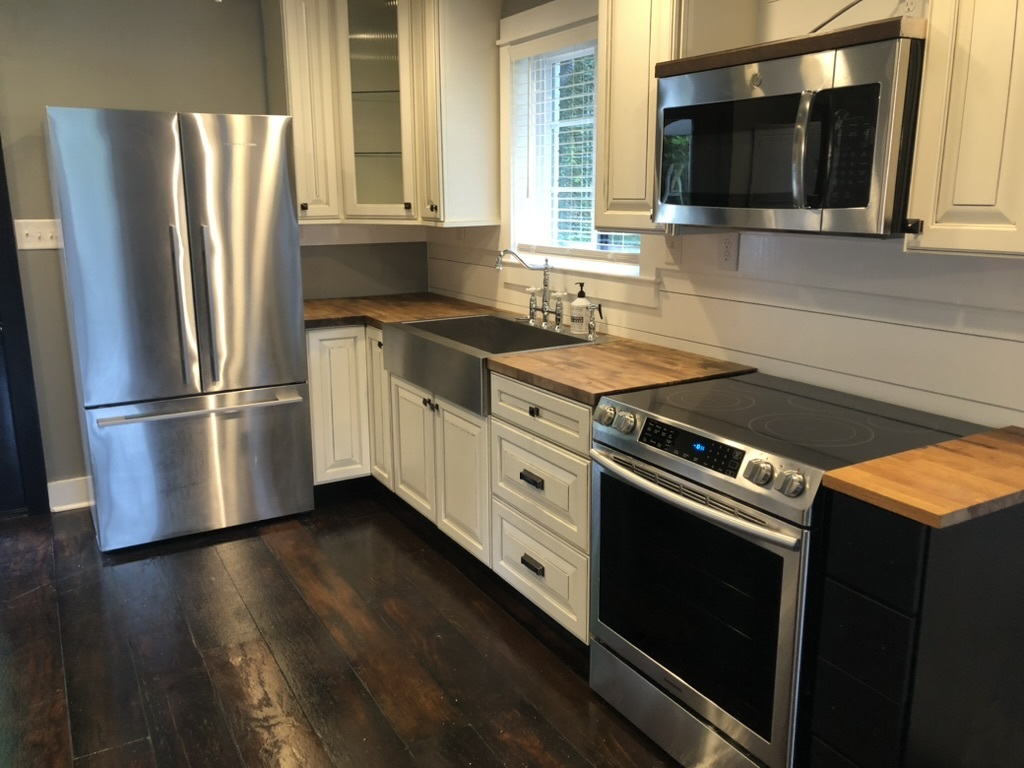 Kitchen with stainless appliances and deep single basin sink. - 20400 Church St