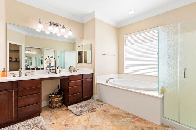Building Photo - Spacious Mountain’s Edge Home with Den, Sunroom, 3-Car Garage & Private Spa Retreat