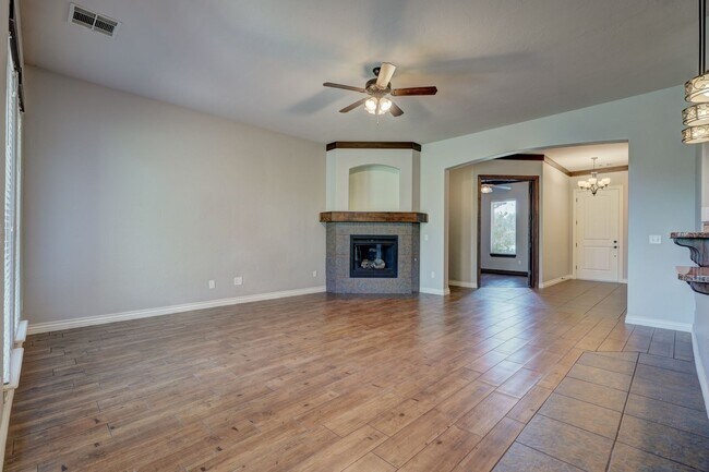 Building Photo - Stunning 3 Bedroom Home with Fireplace, Community Amenities & Open Floor Plan
