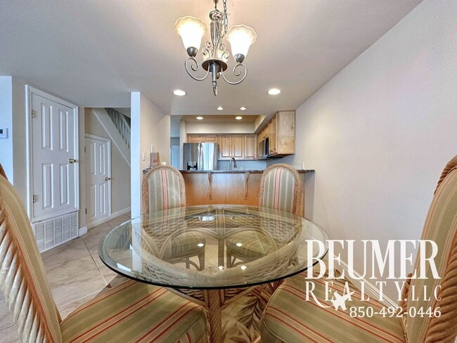 Building Photo - Move-In Ready Intercoastal Waterfront Townhome Steps to the water