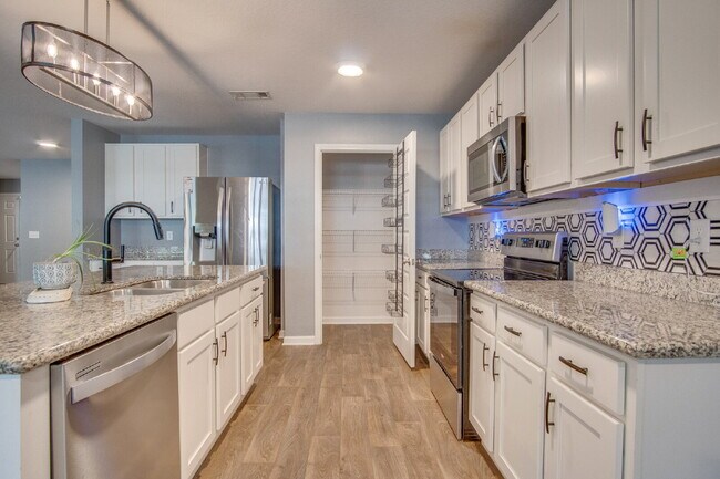 Building Photo - Move In for the Holidays! Heated Saltwater Pool & Tropical Backyard –$500 OFF First Month + Milit...