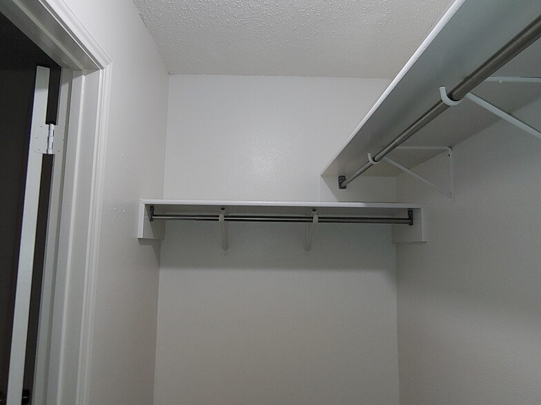 Master bedroom closet. - 6466 Beech Trail Dr