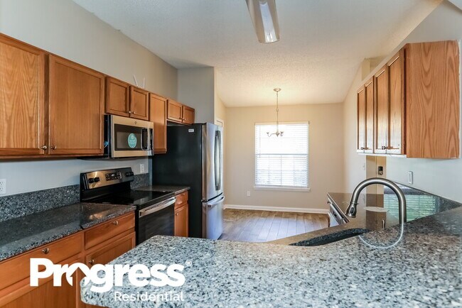 Building Photo - 7637 Invermere Blvd N