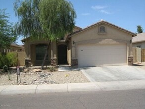 Building Photo - COMING SOON! Spacious 3 Bed 2 Bath Home in Surprise Farms!