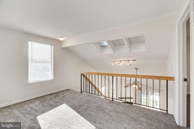 Building Photo - Elevated Comfort: Spacious Condo with Loft and Fireplace