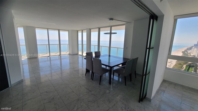 Building Photo - 3 br, 2.5 bath Condo - 6365 Collins Ave En...