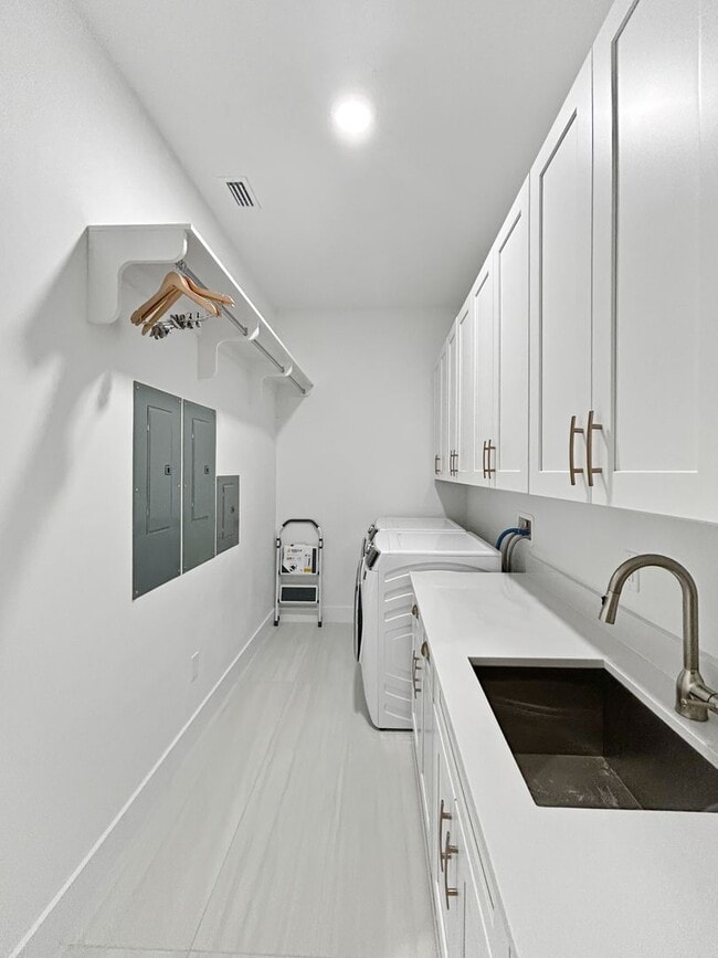 Building Photo - Waterfront Johns Pass Luxury | Steps to Beach + Pool, Hot Tub & Dock