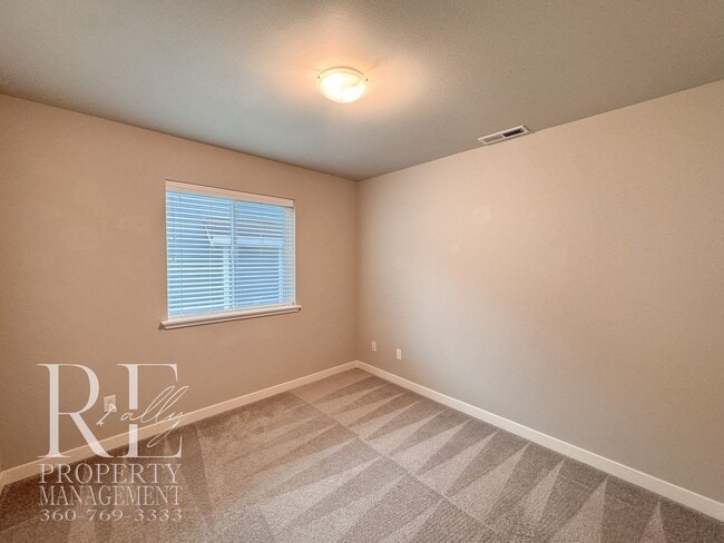 Building Photo - Vaulted Ceilings, Tree-Lined Views & a Spacious Primary Suite Retreat