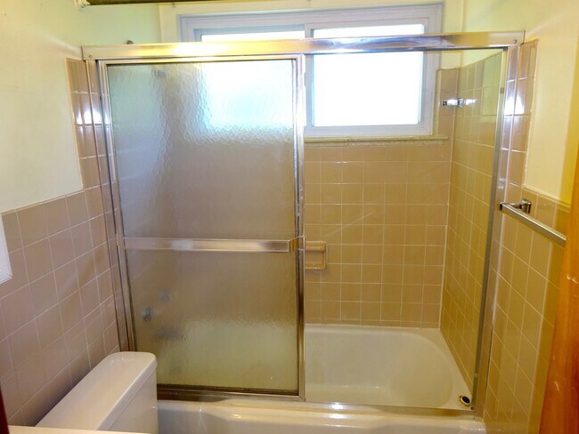 Building Photo - Two Bedroom Apartment With Hardwood Floors...