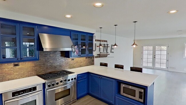 Building Photo - Beautifully Upgraded 4 Bedroom Pool House ...