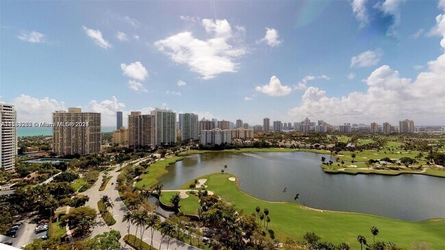 Building Photo - 3675 N Country Club Dr