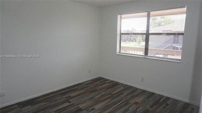 Building Photo - 10057 Winding Lake Rd