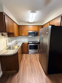 Building Photo - Beautiful Home in Fabulous Loacation! SS Appliances, NEW Carpet, Patio, W/D, Includes W/S/G!