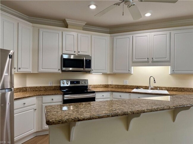 Building Photo - Coastal Comfort: Spacious 2-Bedroom Condo Retreat in Virginia Beach