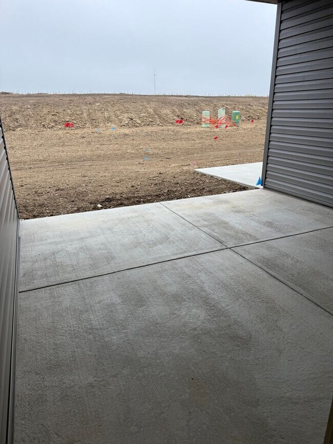 Building Photo - Walkout ranch townhome with 2 stall garage...