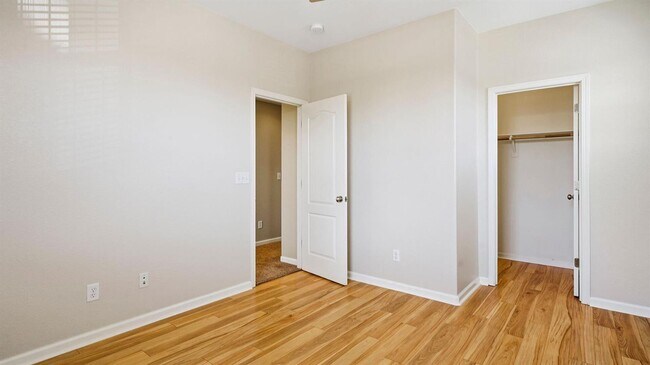 Building Photo - ADORABLE 4 BED/2.5 BATH TOWNHOME WITH CORNER LOT AND LARGE FENCED REAR YARD WITH PATIO