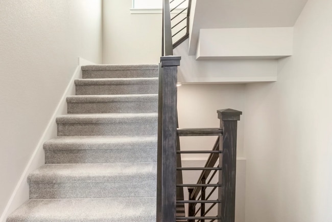 Stairs upstairs to the three bedroom and down to basement - 6245 Hanover St