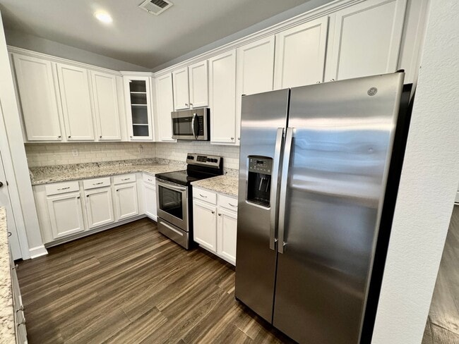 Building Photo - A 1st-Time Rental Available NOW! 3/3.5 Newer End-Unit Townhome w/Garage - Landscaping Included!