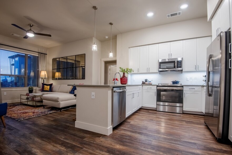 Kitchen and living room with hard surface flooring - Avalon Lowry