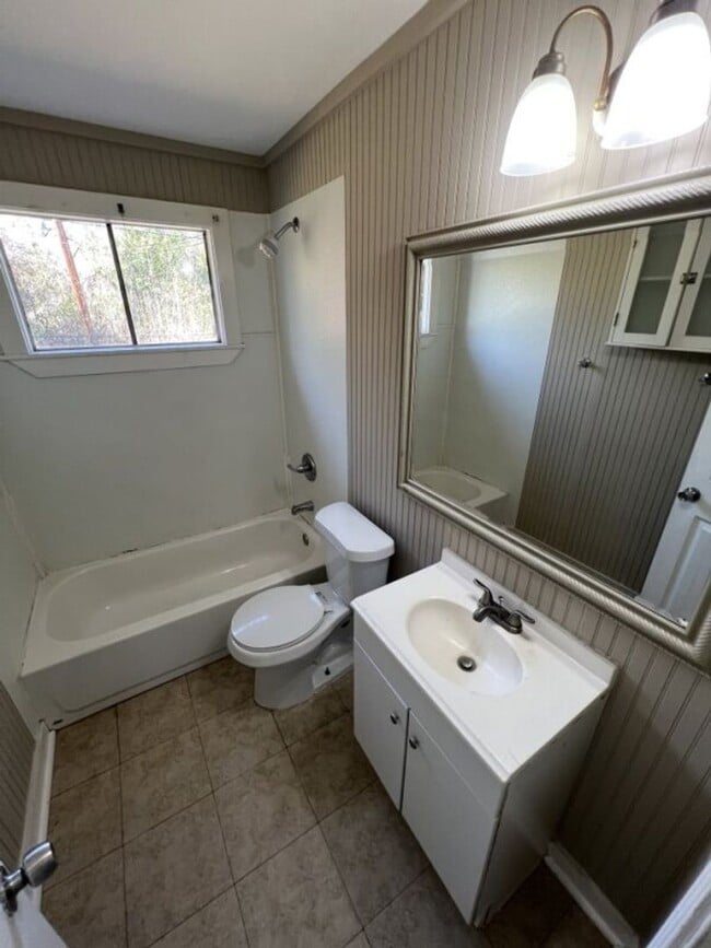 Building Photo - Cozy Brick Home with Covered Parking – Denova St.