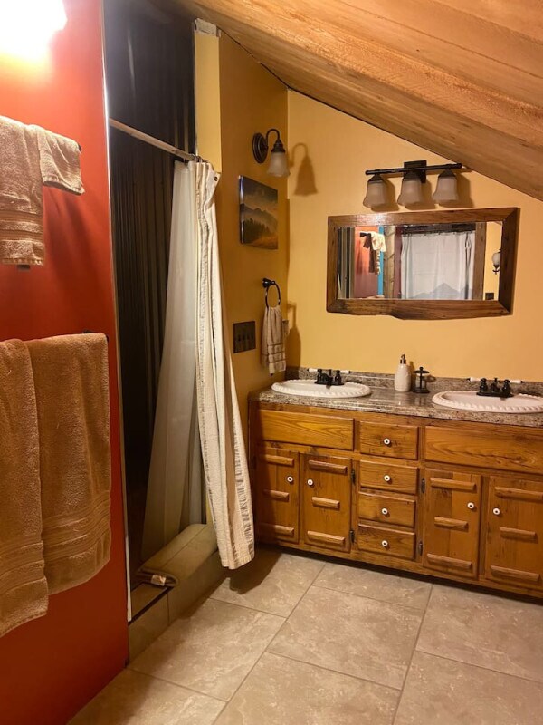 bathroom vanity next to shower - 1314 Rugby Rd