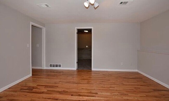 Building Photo - AVAILABLE AUGUST! Huge 4 bedroom/2 bath home with large fenced yard