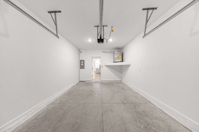 Building Photo - Be the First to Lease This 3BR Townhome in Marion Ranch | Loft + Garage + Screened Lanai + Includ...