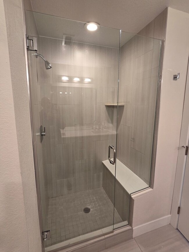 Building Photo - STUNNING 4-LEVEL TOWNHOME IN HIGHLANDS WITH SAUNA, 2-CAR GARAGE + AMAZING ROOFTOP DECK!