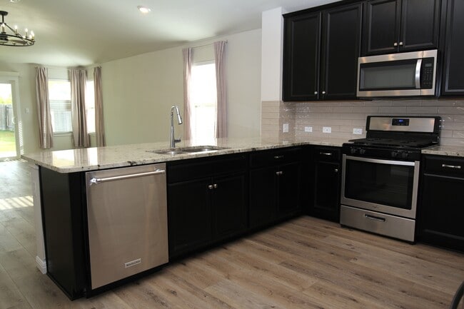 Building Photo - 6032 Genova Pl