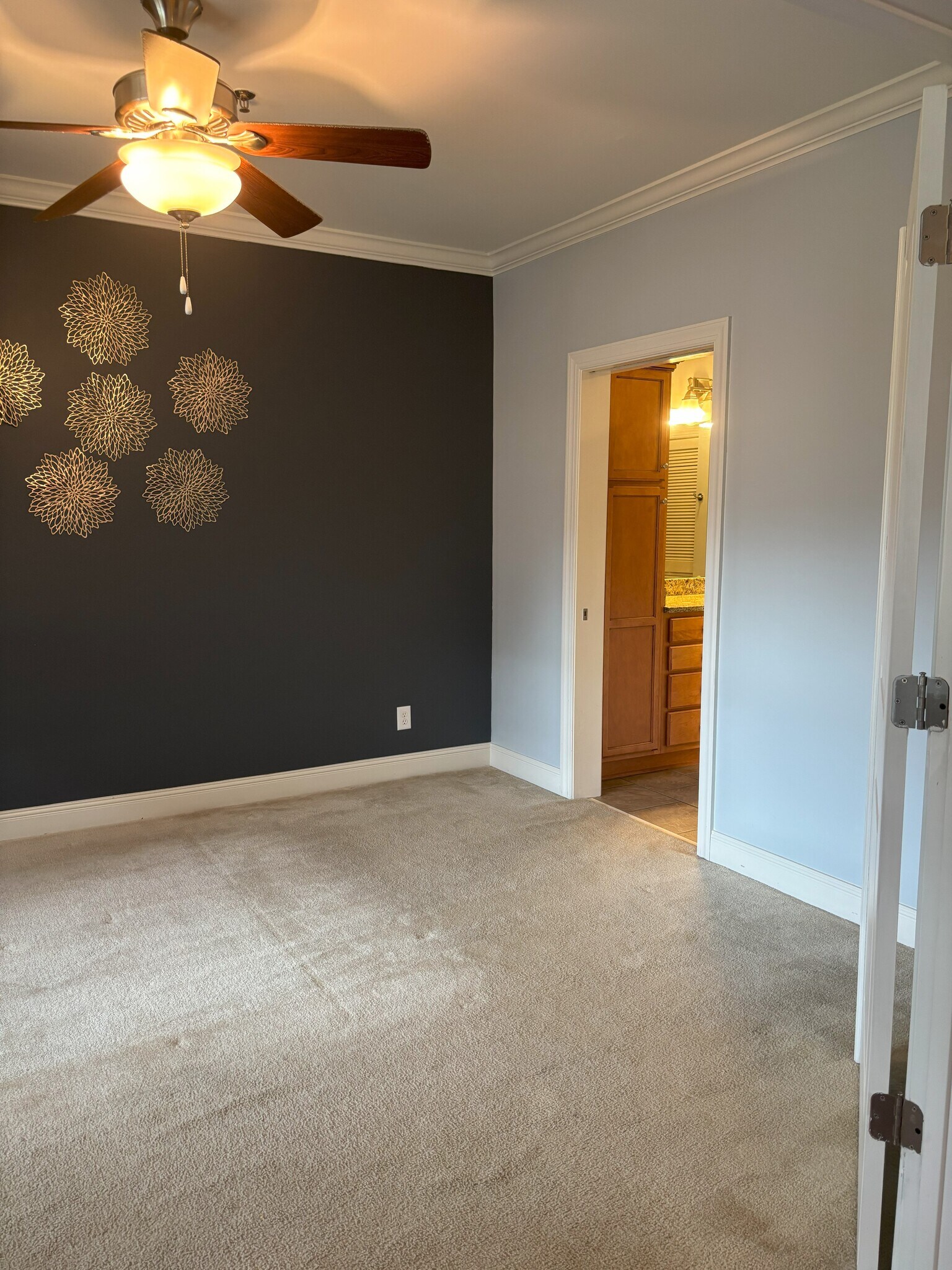primary bedroom and pocket door into bathroom - 301 Criddle St