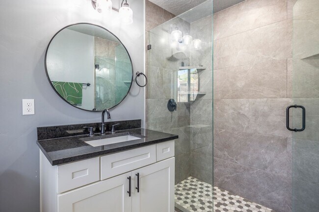Building Photo - Exquisitely Renovated 4-Bedroom Oasis with Modern Upgrades