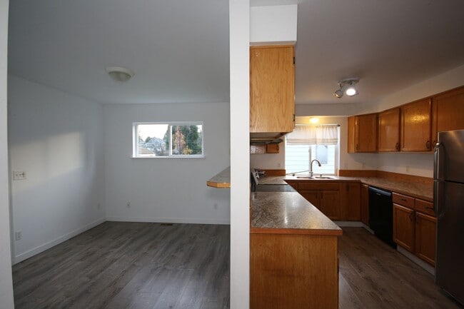 Building Photo - Updated Tacoma Home with Spacious Layout & Fully Fenced Yard