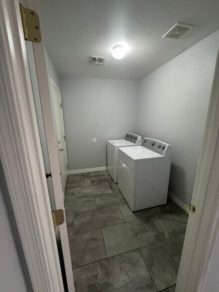 Laundry room - 10791 W Roanoke Ave