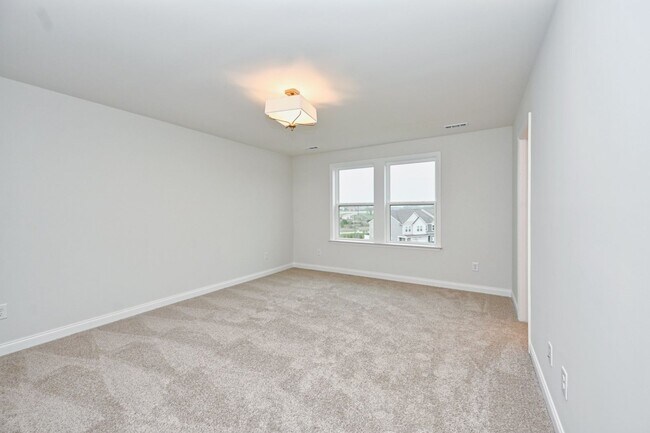 Building Photo - **BE THE LUCKY ONE TO LIVE IN THIS 2024-BUILT TOWNHOME**