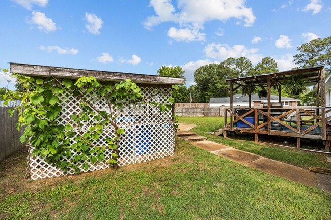 Building Photo - Spacious 4-Bedroom Home with Saltwater Pool & Large Fenced Yard
