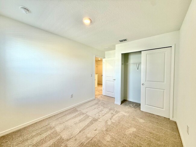 Building Photo - Riverside living redefined - 3Bedrooms/2.5Baths newly built townhome in Edgewater!