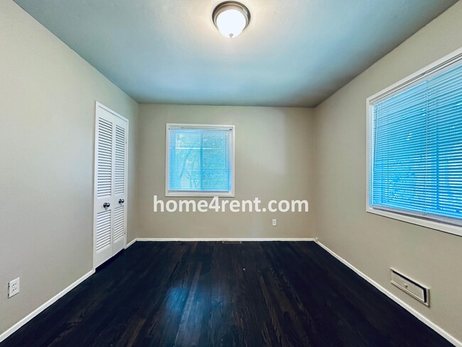 Building Photo - Attractive Prairie Village Ranch w/ FRESH PAINT, Wood Floors, Granite Counters and a Fenced Yard!