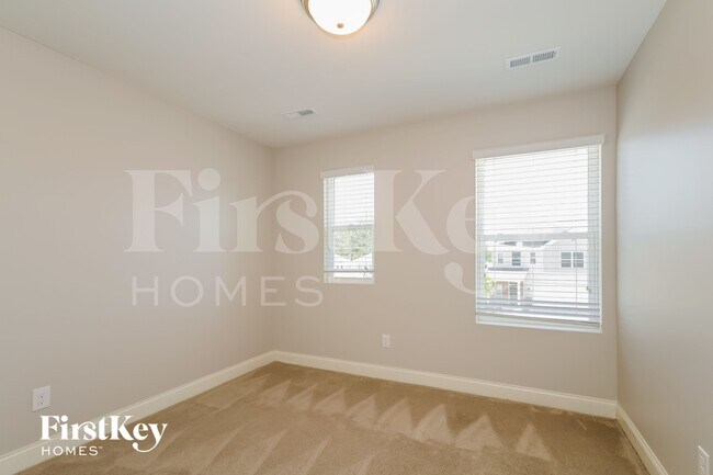 Building Photo - 9026 Evans Woods Dr