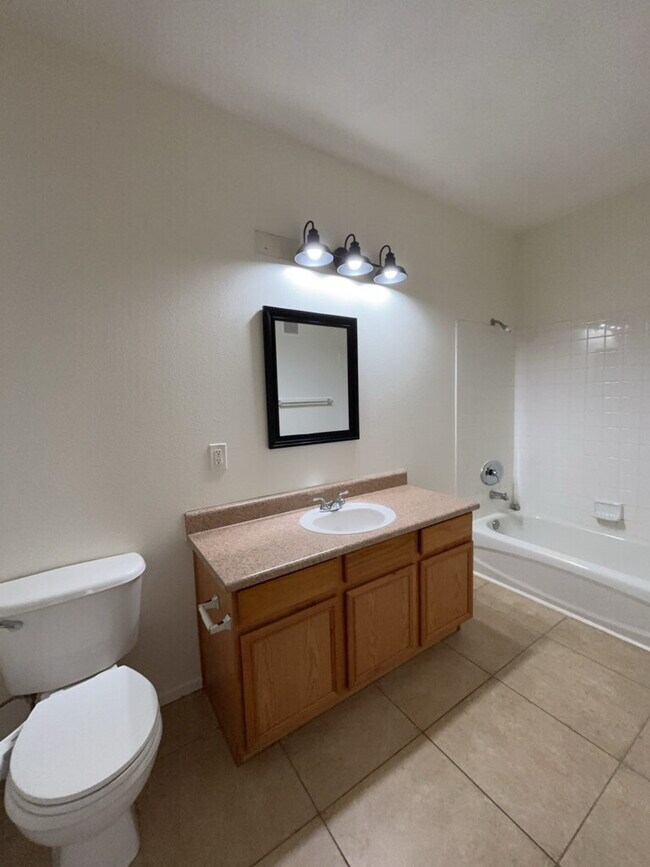 Building Photo - COZY 2 BEDROOM 2 FULL BATH CONDO LOCATED ON SECOND LEVEL