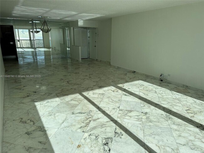 Building Photo - 6039 Collins Ave
